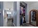 Bedroom view into walk-in closet and bath at 3370 Ocean Shore Blvd # 205-B, Ormond Beach, FL 32176