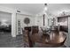 Dining room with sightlines into the kitchen featuring granite countertops at 3370 Ocean Shore Blvd # 205-B, Ormond Beach, FL 32176
