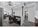 Updated kitchen featuring stainless appliances, dark cabinets, and an open layout for seamless entertaining at 3370 Ocean Shore Blvd # 205-B, Ormond Beach, FL 32176