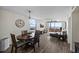 Bright living room with ocean views, dining area, and modern furnishings at 3370 Ocean Shore Blvd # 205-B, Ormond Beach, FL 32176