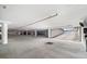 Open parking garage with easy access and ample parking spaces for residents and visitors to utilize at 3370 Ocean Shore Blvd # 205-B, Ormond Beach, FL 32176