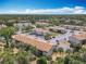 High angle view of property showcasing parking and lush landscaping at 420 Banana Cay Dr # A, South Daytona, FL 32119