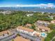Aerial view of property featuring landscaping, parking and complex at 420 Banana Cay Dr # A, South Daytona, FL 32119