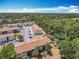A peaceful community with mature trees around it, offering a quiet atmosphere at 420 Banana Cay Dr # A, South Daytona, FL 32119