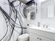 Tastefully updated bathroom with modern fixtures and a stylish shower curtain at 420 Banana Cay Dr # A, South Daytona, FL 32119