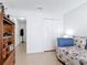 Relaxing bedroom with neutral colors, closet and comfortable daybed at 420 Banana Cay Dr # A, South Daytona, FL 32119