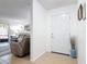 A welcoming entryway with tile flooring and a view into the adjacent living room space at 420 Banana Cay Dr # A, South Daytona, FL 32119
