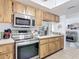 Well-equipped kitchen featuring stainless steel appliances and ample counter space at 420 Banana Cay Dr # A, South Daytona, FL 32119