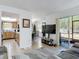 Inviting living area open to kitchen and dining areas, perfect for entertaining at 420 Banana Cay Dr # A, South Daytona, FL 32119