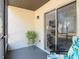 Cozy enclosed patio featuring seating, a small table and view to the interior at 420 Banana Cay Dr # A, South Daytona, FL 32119