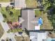 Aerial view of home, showcasing roof and mature landscaping at 44 Sandra Dr, Ormond Beach, FL 32176
