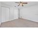 Neutral bedroom with large closet and ceiling fan at 44 Sandra Dr, Ormond Beach, FL 32176