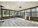 Screened sunroom with tiled floor and access to the yard at 44 Sandra Dr, Ormond Beach, FL 32176