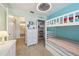 Bright bedroom with built-in bunkbeds and a shared bathroom at 440 Champagne Cir, Port Orange, FL 32127