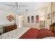 Comfortable bedroom with ceiling fan and bright decor at 440 Champagne Cir, Port Orange, FL 32127