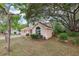 Exterior view of a charming two-story home with manicured front lawn at 440 Champagne Cir, Port Orange, FL 32127