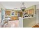 Spacious kitchen featuring stainless steel appliances, wood cabinets, and a breakfast nook at 440 Champagne Cir, Port Orange, FL 32127