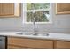 Close up of a modern, double-basin stainless steel kitchen sink at 5620 Ridgewood Ave, De Leon Springs, FL 32130