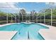 Private screened-in pool with spa, perfect for relaxation and entertaining at 6 Talaquah Blvd, Ormond Beach, FL 32174