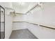 Walk-in closet with built in shelves and hanging racks at 6 Talaquah Blvd, Ormond Beach, FL 32174