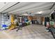 Spacious garage featuring a home gym at 912 Fruitwood Pl, Port Orange, FL 32127