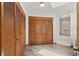 Hallway featuring a series of wooden closets leading to the bathroom at 912 Fruitwood Pl, Port Orange, FL 32127