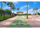 Enjoy a relaxing game of shuffleboard under the Florida sun at this community amenity, with palm trees and a gazebo at 912 Fruitwood Pl, Port Orange, FL 32127