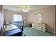 Bright bedroom with a ceiling fan and charming decor at 10031 Sw 62Nd Cir, Ocala, FL 34476