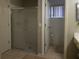Main bathroom featuring a shower and separate toilet space for added privacy and convenience at 10031 Sw 62Nd Cir, Ocala, FL 34476