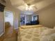 Spacious main bedroom with access to a walk-in closet and bathroom, creating a private retreat at 10031 Sw 62Nd Cir, Ocala, FL 34476