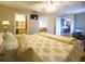 Well-lit main bedroom with easy access to the bathroom, walk-in closet, and kitchen at 10031 Sw 62Nd Cir, Ocala, FL 34476