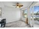 Open dining area with large windows offering scenic views of the lake at 129 Golden Eye Dr # C, Daytona Beach, FL 32119