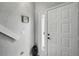Bright entryway featuring a stylish door, modern decor, and neutral paint at 129 Golden Eye Dr # C, Daytona Beach, FL 32119