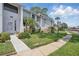 Charming townhome with landscaped front yard and a welcoming entrance at 129 Golden Eye Dr # C, Daytona Beach, FL 32119