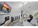 Spacious living room with high ceilings, modern decor, and lots of natural light at 129 Golden Eye Dr # C, Daytona Beach, FL 32119