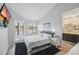 Comfortable main bedroom with an ensuite bathroom and views of the water at 129 Golden Eye Dr # C, Daytona Beach, FL 32119