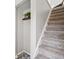 Carpeted staircase featuring a decorative nook and neutral paint at 129 Golden Eye Dr # C, Daytona Beach, FL 32119