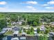 An elevated aerial view showcasing the neighborhood streets and boating canals of this lovely community at 24538 Wildhog Rd, Astor, FL 32102