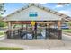 A well-maintained boat house with a sign and a sturdy structure for boat storage and waterfront activities at 24538 Wildhog Rd, Astor, FL 32102