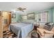 Serene bedroom featuring a comfortable bed, soft lighting, and tranquil decor at 24538 Wildhog Rd, Astor, FL 32102
