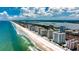 Magnificent aerial view showcasing the coastline and luxurious high-rise condos on a sunny day at 2937 S Atlantic Ave # 2001, Daytona Beach, FL 32118