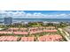 An eye-level aerial view of the neighborhood with waterways and blue skies at 2937 S Atlantic Ave # 2001, Daytona Beach, FL 32118