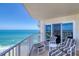 Oceanfront balcony with lounge furniture and stunning views of the water and sky at 2937 S Atlantic Ave # 2001, Daytona Beach, FL 32118