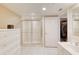 Clean bathroom featuring a glass shower and dresser at 2937 S Atlantic Ave # 2001, Daytona Beach, FL 32118