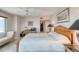 Comfortable bedroom with a desk space and walk-in closet at 2937 S Atlantic Ave # 2001, Daytona Beach, FL 32118