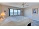 Bedroom with tile floors, a window overlooking the water and a large closet at 2937 S Atlantic Ave # 2001, Daytona Beach, FL 32118