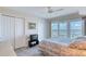 Bedroom with a beautiful view, tile floors, ceiling fan, and closet space at 2937 S Atlantic Ave # 2001, Daytona Beach, FL 32118