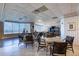 Inviting dining area with large window view, plenty of seating and decorative details at 2937 S Atlantic Ave # 2001, Daytona Beach, FL 32118