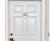 Close-up of the white unit door, showcasing the unit number and design at 2937 S Atlantic Ave # 2001, Daytona Beach, FL 32118