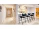 Kitchen with breakfast bar and three chairs at 2937 S Atlantic Ave # 2001, Daytona Beach, FL 32118